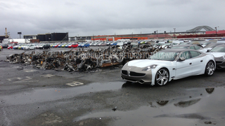 Illustration for article titled More Than A Dozen Fisker Karma Hybrids Caught Fire And Exploded In New Jersey Port After Sandy